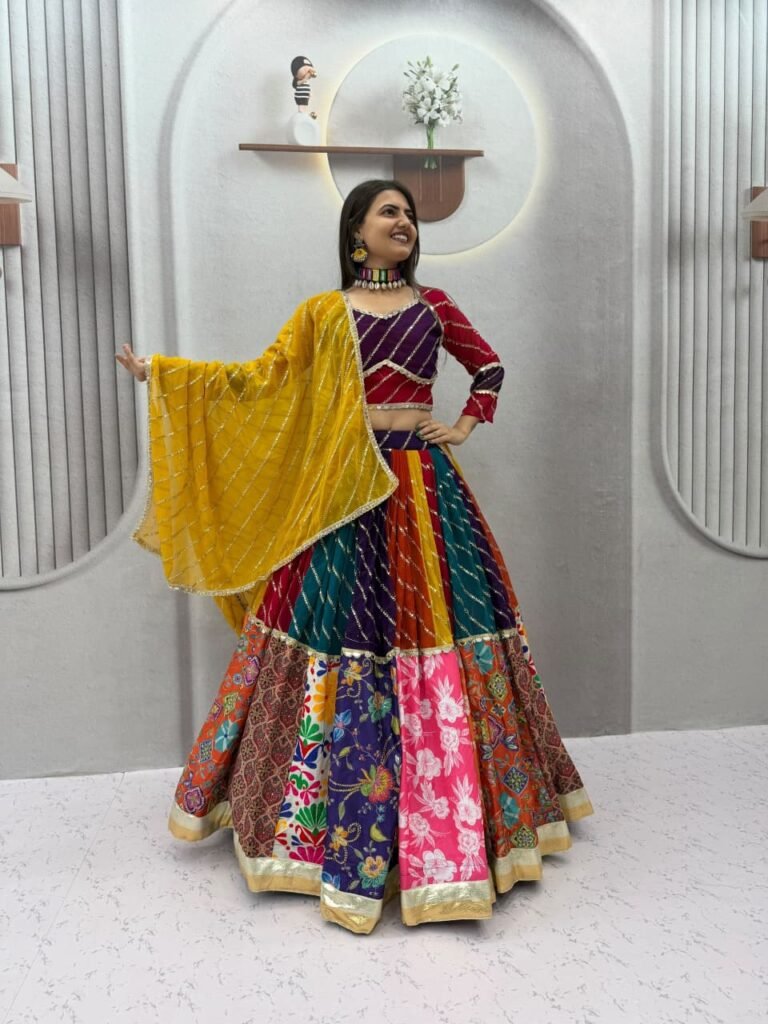 Model in a multicolour patchwork lehenga with a contrast choli and yellow dupatta